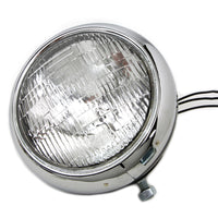 33-0067 - Black Replica 7  Round Headlamp 6 Volt by Wyatt Gatling