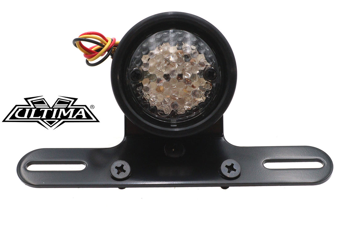 33-8232 - Drilled Black Bezel Tail Lamp by Ultima