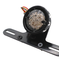 33-8232 - Drilled Black Bezel Tail Lamp by Ultima